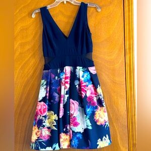 Size 6 Xscape formal dress. Navy top with beautiful floral print .